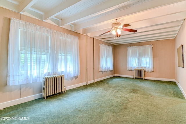 1416 Garven Ave, Ocean Twp, NJ 07712 - carpeted empty room with radiator heating unit, plenty of natural light, beamed ceiling, and a ceiling fan