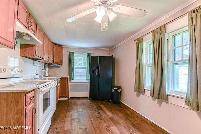 1416 Garven Ave, Ocean Twp, NJ 07712 - kitchen with white electric range oven, black refrigerator with ice dispenser, under cabinet range hood, radiator, and light countertops