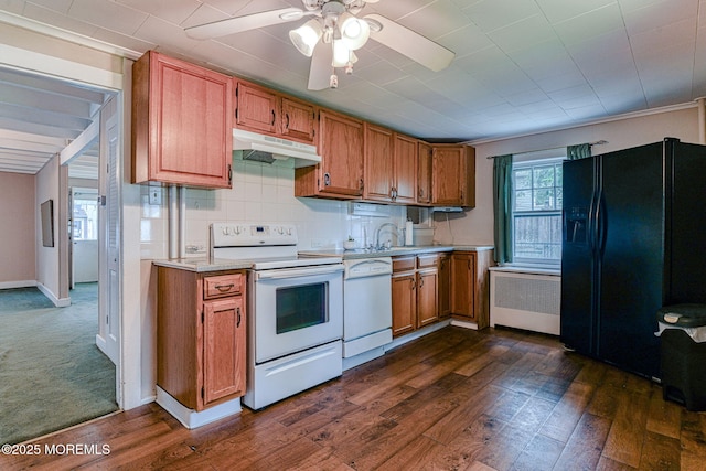 1416 Garven Ave, Ocean Twp, NJ 07712 - kitchen featuring white appliances, radiator heating unit, under cabinet range hood, light countertops, and brown cabinets