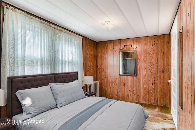 1416 Garven Ave, Ocean Twp, NJ 07712 - carpeted bedroom with radiator heating unit and wooden walls