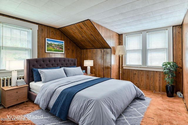 1416 Garven Ave, Ocean Twp, NJ 07712 - bedroom with wooden walls, lofted ceiling, carpet, and radiator