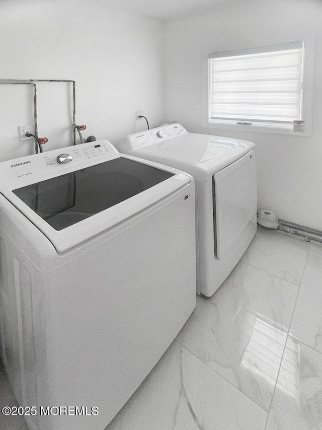 177 N Ensign Dr, Little Egg Harbor, NJ 08087 - laundry area with light marble finish floors and washing machine and dryer