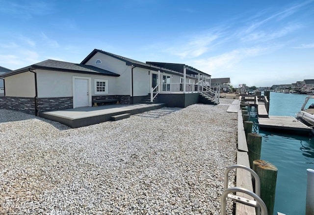 177 N Ensign Dr, Little Egg Harbor, NJ 08087 - rear view of house featuring stucco siding and a deck