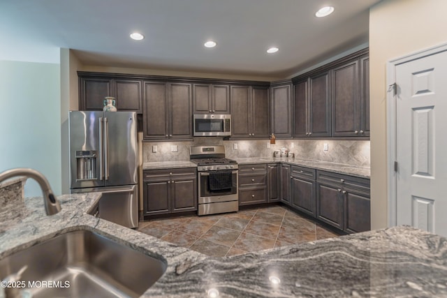51 Galley Way, Little Egg Harbor, NJ 08087 - kitchen featuring stainless steel appliances, dark brown cabinetry, decorative backsplash, and recessed lighting