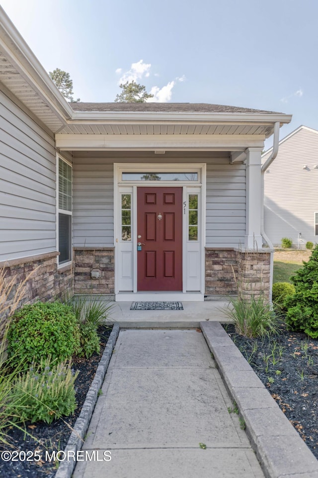 51 Galley Way, Little Egg Harbor, NJ 08087 - view of exterior entry with stone siding and a porch