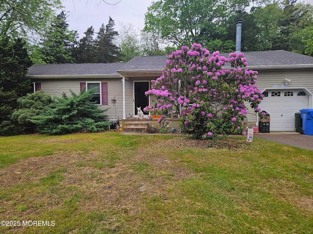 124 Cedar Swamp Rd, Jackson, NJ 08527 - view of front of house with a front yard, an attached garage, and driveway