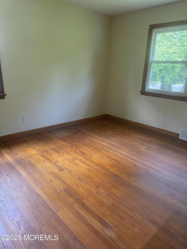 132 Harrison Ave, Fair Haven, NJ 07704 - empty room with wood finished floors and baseboards