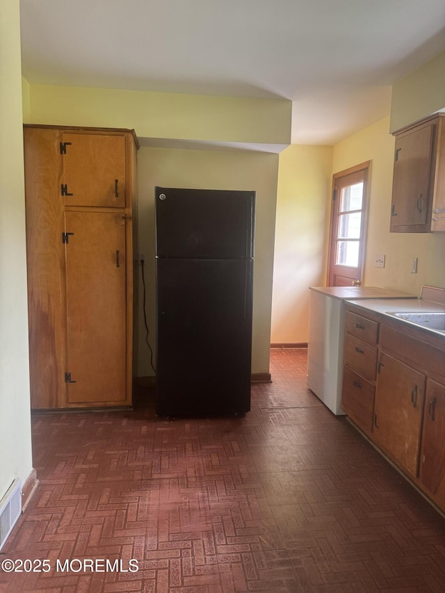 132 Harrison Ave, Fair Haven, NJ 07704 - kitchen featuring freestanding refrigerator and light countertops