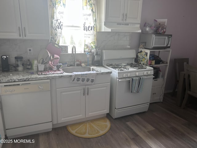 13-15 Haag St, Sayreville, NJ 08872 - kitchen with white appliances, under cabinet range hood, white cabinetry, wood finished floors, and backsplash