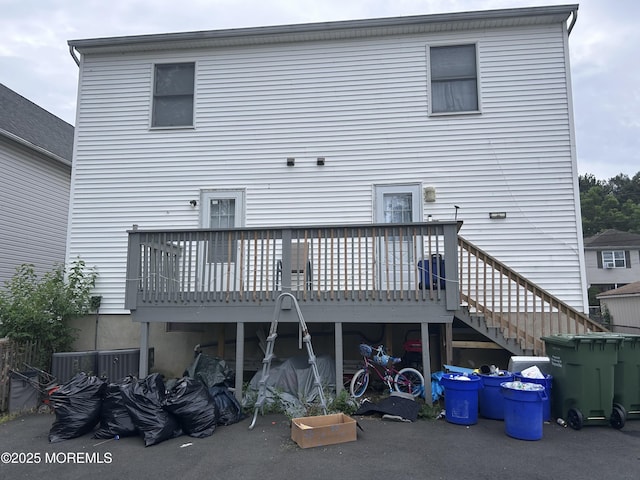 13-15 Haag St, Sayreville, NJ 08872 - rear view of property featuring a wooden deck and stairs