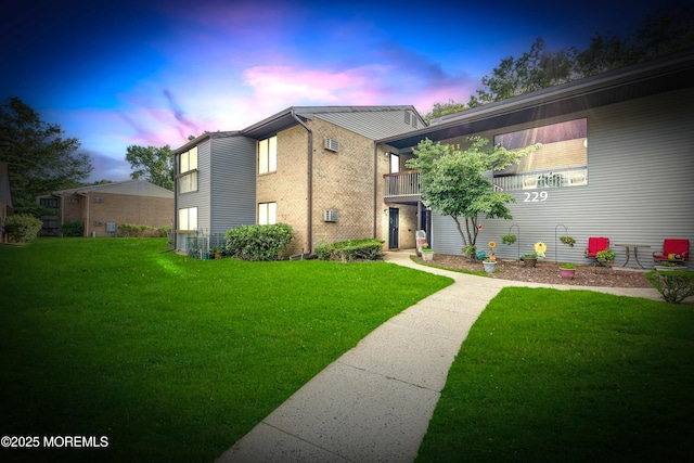 229 Medford Ct Unit B, Manalapan, NJ 07726 - view of front of home with a front lawn and brick siding