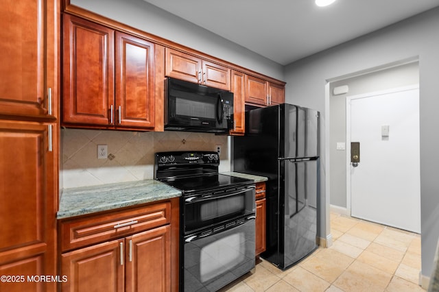 229 Medford Ct Unit B, Manalapan, NJ 07726 - kitchen featuring black appliances, backsplash, and light stone countertops