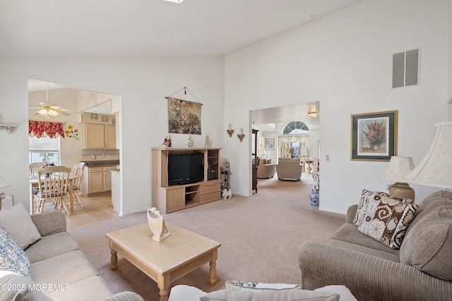 9 Penny Ln, Jackson, NJ 08527 - living area with a ceiling fan, high vaulted ceiling, and light carpet