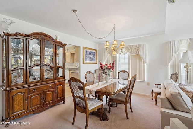 9 Penny Ln, Jackson, NJ 08527 - dining area featuring a chandelier and light colored carpet