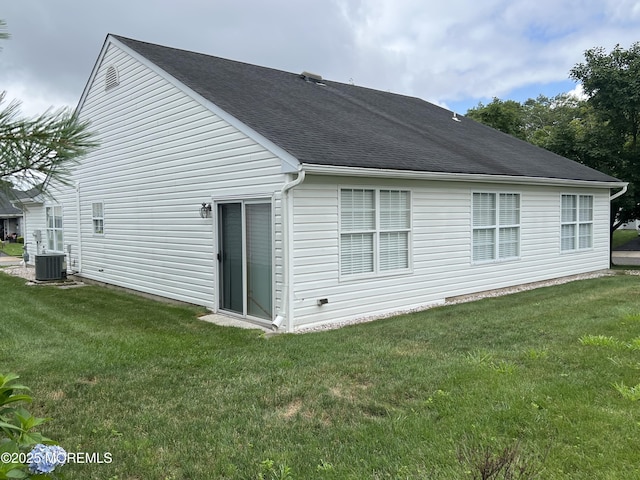 2 Mayapple Dr, Brick, NJ 08724 - rear view of house featuring a lawn and a shingled roof