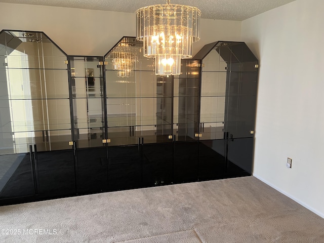 2 Mayapple Dr, Brick, NJ 08724 - interior space featuring carpet, a chandelier, and a textured ceiling