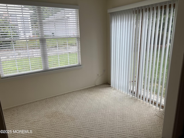 2 Mayapple Dr, Brick, NJ 08724 - carpeted empty room with baseboards
