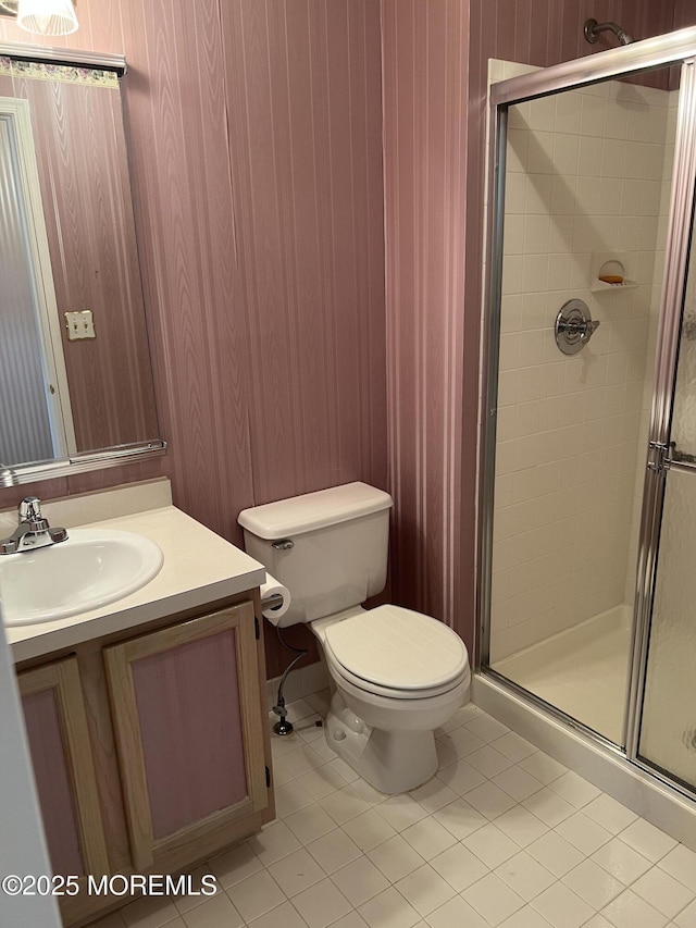 2 Mayapple Dr, Brick, NJ 08724 - bathroom featuring tile patterned flooring, a shower stall, vanity, and wooden walls