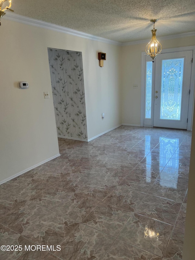 2 Mayapple Dr, Brick, NJ 08724 - empty room featuring a chandelier, ornamental molding, a textured ceiling, and marble finish floors