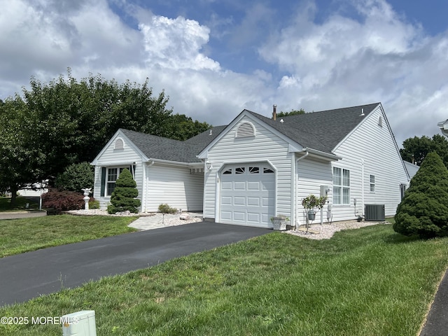 2 Mayapple Dr, Brick, NJ 08724 - view of front of home with a garage, driveway, a shingled roof, and a front yard