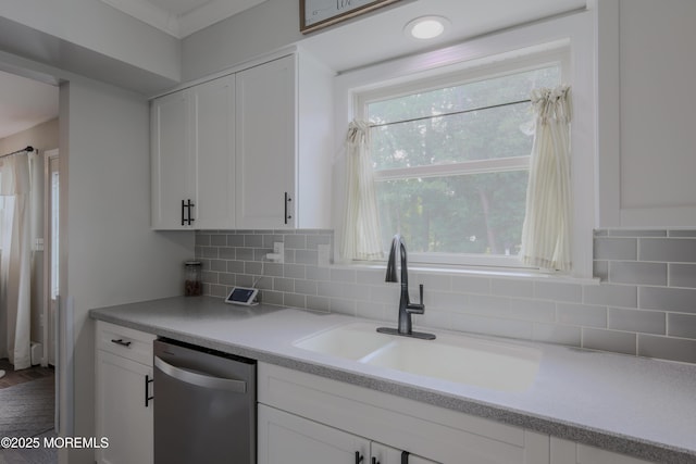 1113 Pemberton St, Toms River, NJ 08757 - kitchen featuring dishwasher, white cabinets, backsplash, and light countertops