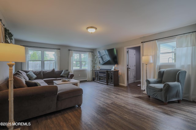1113 Pemberton St, Toms River, NJ 08757 - living room with dark wood-style floors, a baseboard radiator, and a fireplace