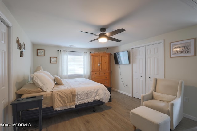 1113 Pemberton St, Toms River, NJ 08757 - bedroom with a closet, wood finished floors, and a ceiling fan