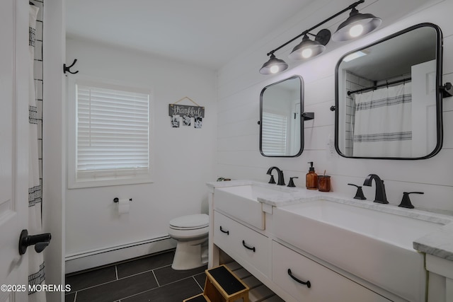 1113 Pemberton St, Toms River, NJ 08757 - bathroom featuring a baseboard heating unit, tile patterned floors, double vanity, and curtained shower