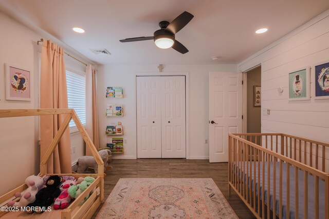 1113 Pemberton St, Toms River, NJ 08757 - bedroom with dark wood-style floors, a closet, recessed lighting, ceiling fan, and a crib