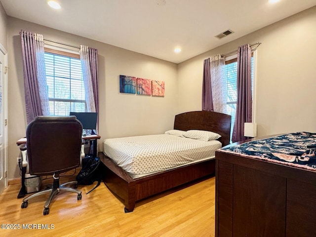 2116 Edward Stec Blvd Unit 2116, Edison, NJ 08837 - bedroom with multiple windows, light wood finished floors, and recessed lighting