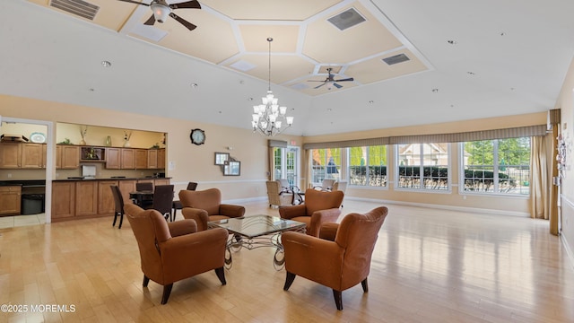 2116 Edward Stec Blvd Unit 2116, Edison, NJ 08837 - living room featuring ceiling fan, plenty of natural light, light wood-style floors, a chandelier, and a towering ceiling