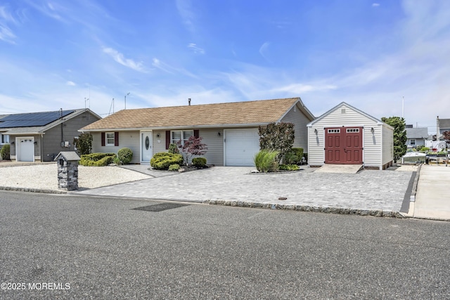 803 Wave Dr, Forked River, NJ 08731 - ranch-style home with an attached garage and decorative driveway