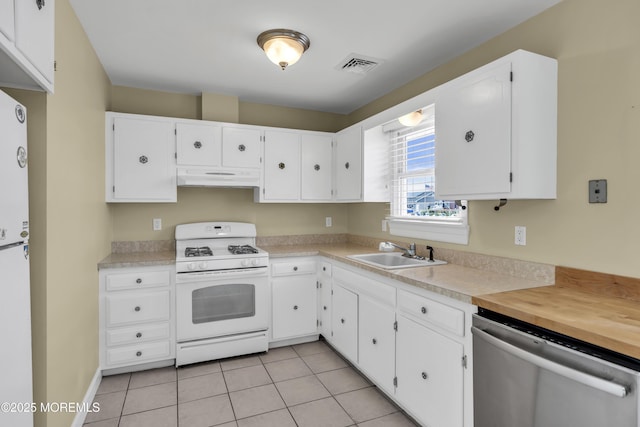 803 Wave Dr, Forked River, NJ 08731 - kitchen with white appliances, light countertops, and white cabinetry