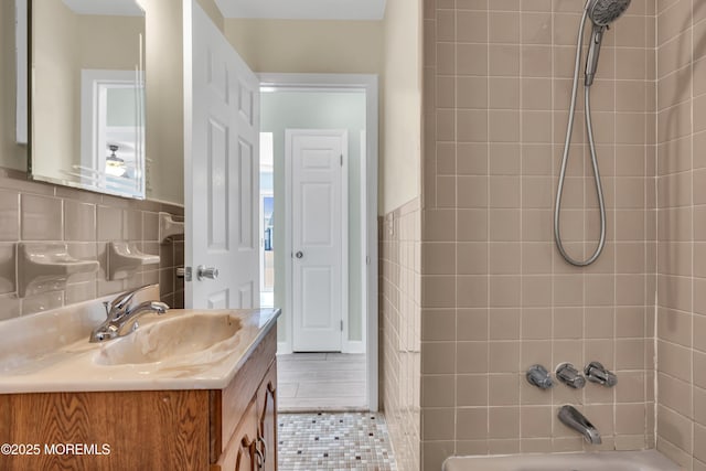 803 Wave Dr, Forked River, NJ 08731 - bathroom with vanity, bathtub / shower combination, and tile walls
