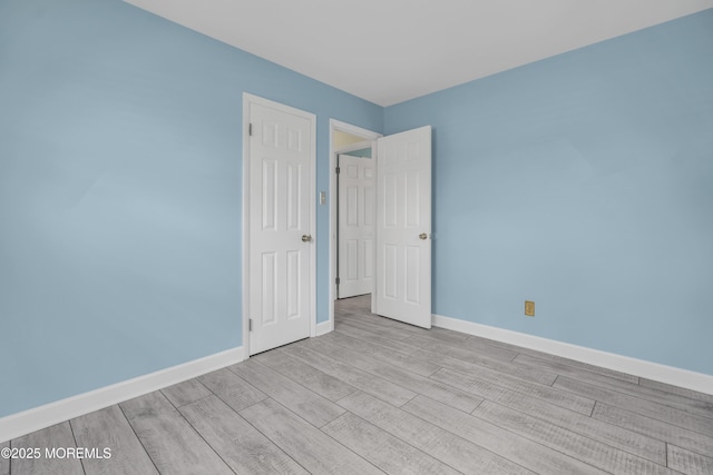803 Wave Dr, Forked River, NJ 08731 - empty room featuring wood finished floors and baseboards