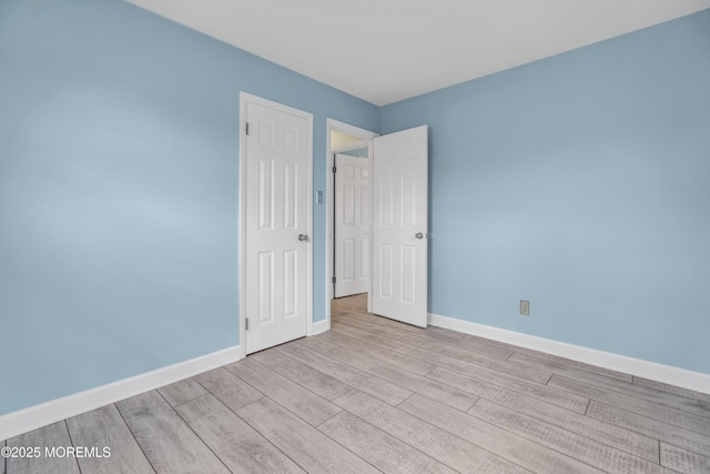 803 Wave Dr, Forked River, NJ 08731 - empty room with wood finished floors and baseboards