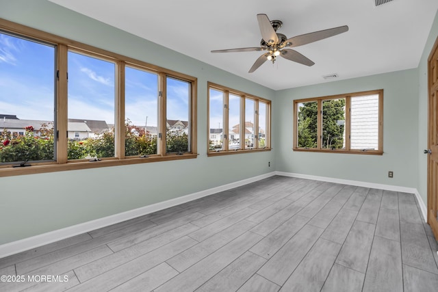 803 Wave Dr, Forked River, NJ 08731 - empty room with a ceiling fan and wood finished floors
