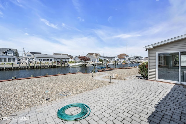 803 Wave Dr, Forked River, NJ 08731 - view of patio / terrace featuring a residential view, a water view, and a boat dock