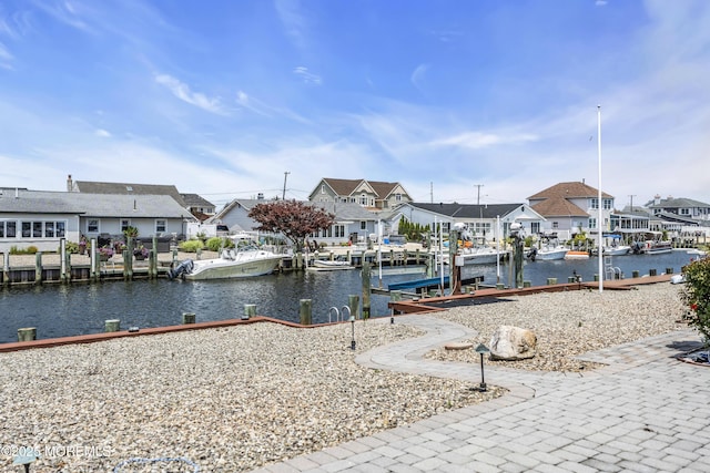 803 Wave Dr, Forked River, NJ 08731 - dock area with boat lift, a residential view, and a water view