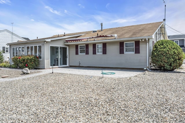 803 Wave Dr, Forked River, NJ 08731 - back of house featuring a patio area and roof with shingles
