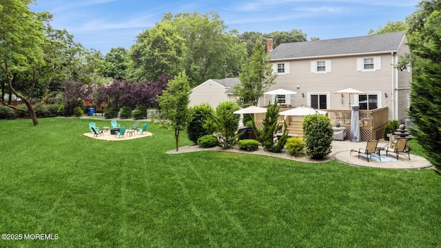 12 Fairway Ave, Eatontown, NJ 07724 - back of property with a patio, a yard, a chimney, and a wooden deck