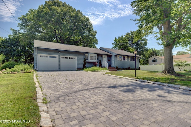 26 Old Manor Rd, Holmdel, NJ 07733 - ranch-style house with driveway and a garage