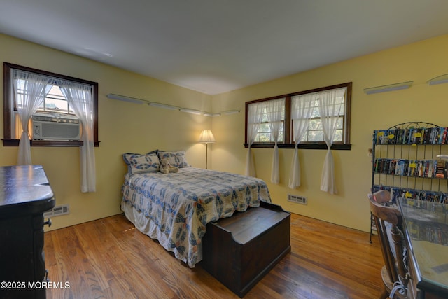 26 Old Manor Rd, Holmdel, NJ 07733 - bedroom with wood finished floors and cooling unit