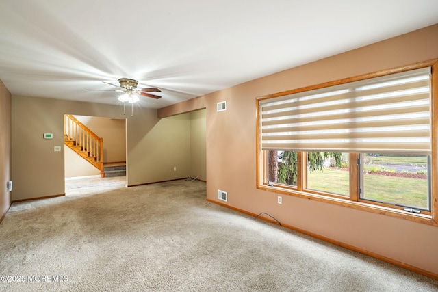 424 Continental St, Forked River, NJ 08731 - unfurnished living room featuring carpet, a ceiling fan, and stairs