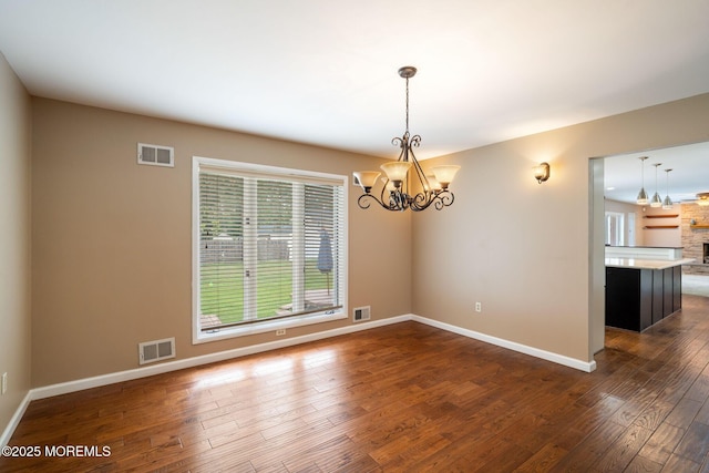 424 Continental St, Forked River, NJ 08731 - empty room featuring a chandelier and dark wood-style floors