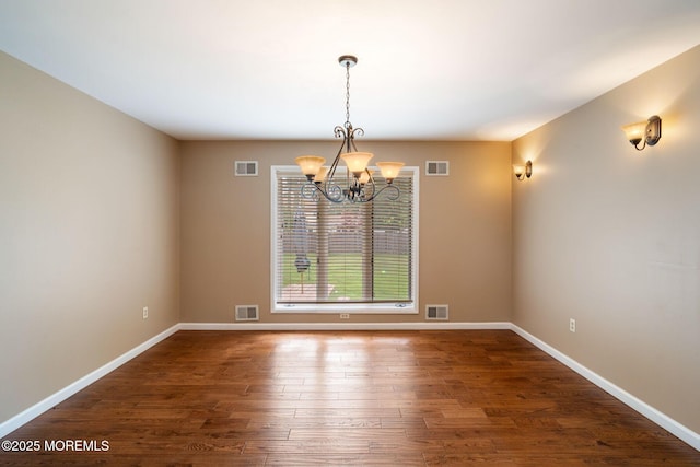 424 Continental St, Forked River, NJ 08731 - unfurnished room with a chandelier and dark wood-style floors