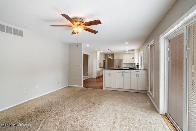 424 Continental St, Forked River, NJ 08731 - kitchen featuring dark countertops, a ceiling fan, stainless steel refrigerator, carpet flooring, and recessed lighting