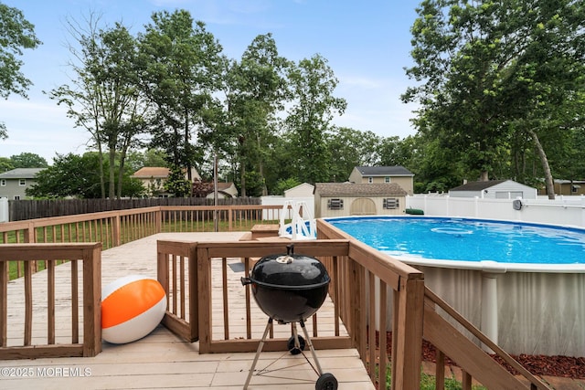 424 Continental St, Forked River, NJ 08731 - view of pool featuring a wooden deck, a fenced backyard, and a grill