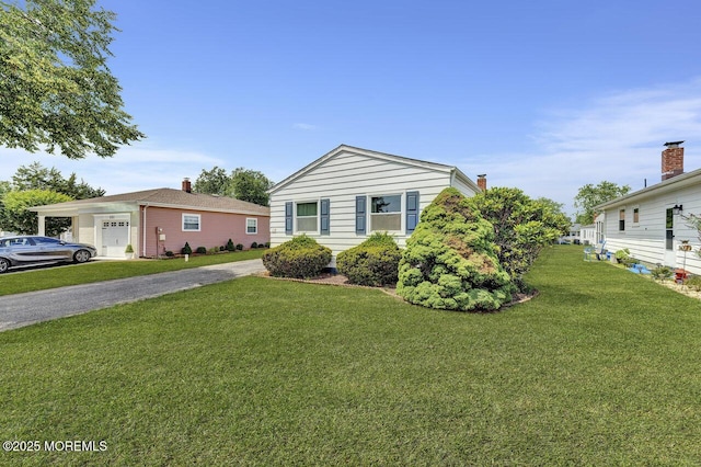 119 Hyannis St, Toms River, NJ 08757 - view of front of house with a front lawn, a garage, and driveway
