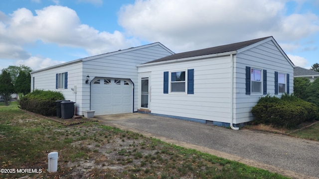 119 Hyannis St, Toms River, NJ 08757 - view of front of house featuring crawl space, an attached garage, and driveway